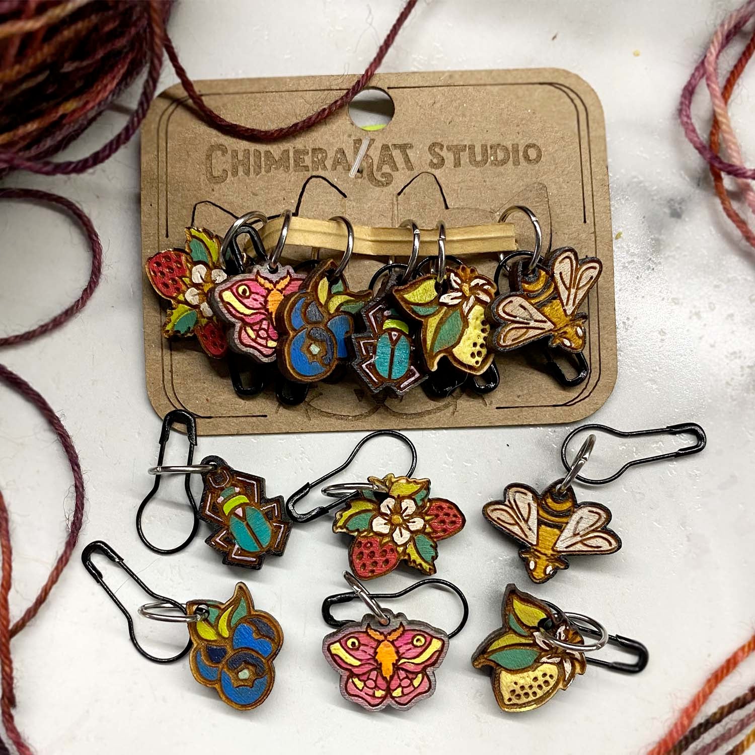 The Garden Party hand painted stitch marker set from ChimeraKat Studio