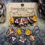 The Pupper hand painted stitch marker set from ChimeraKat Studio