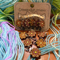 The Daisy hand painted stitch marker set from ChimeraKat Studio