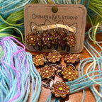 The Daisy hand painted stitch marker set from ChimeraKat Studio