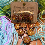 The Daisy hand painted stitch marker set from ChimeraKat Studio