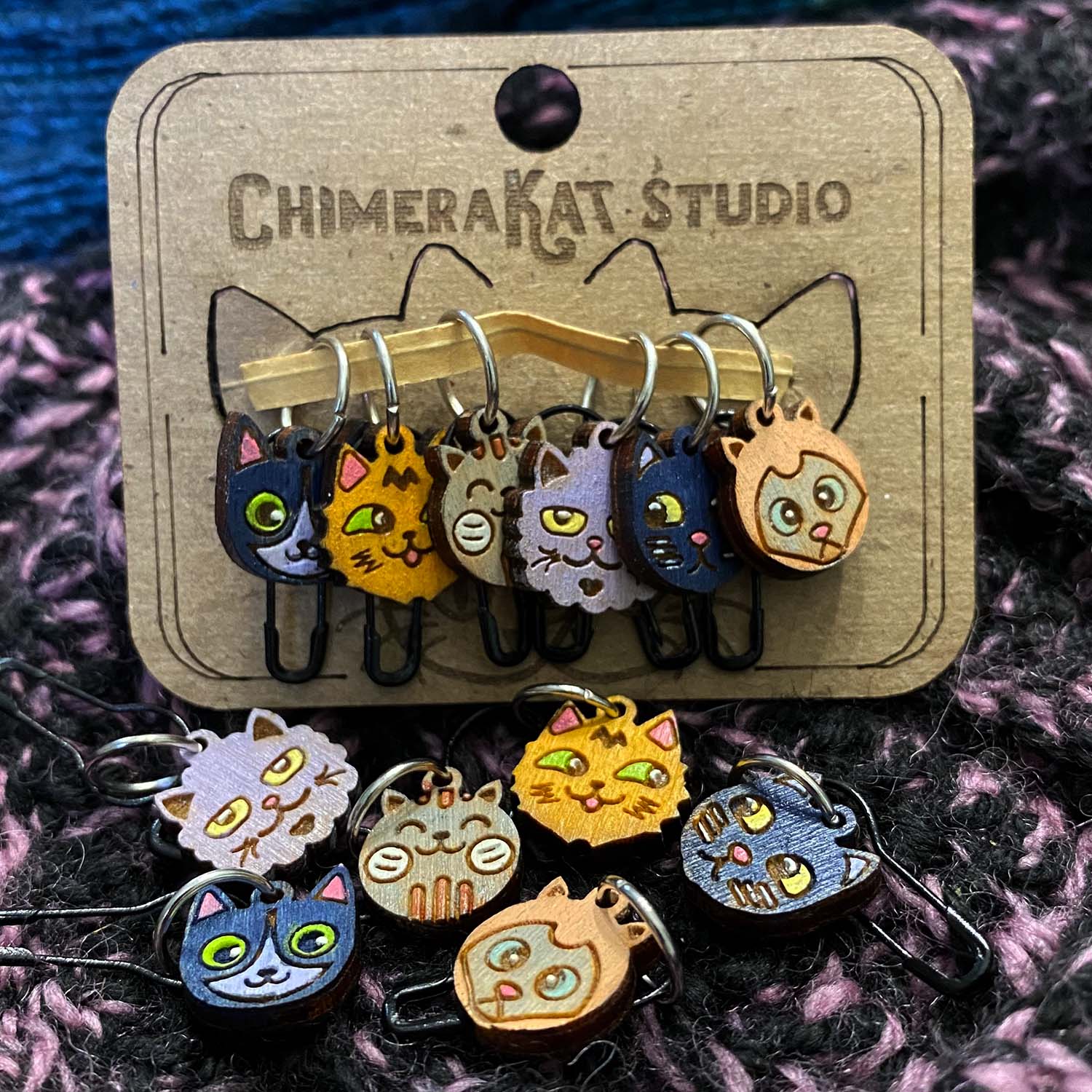 The Kitties hand painted stitch marker set from ChimeraKat Studio